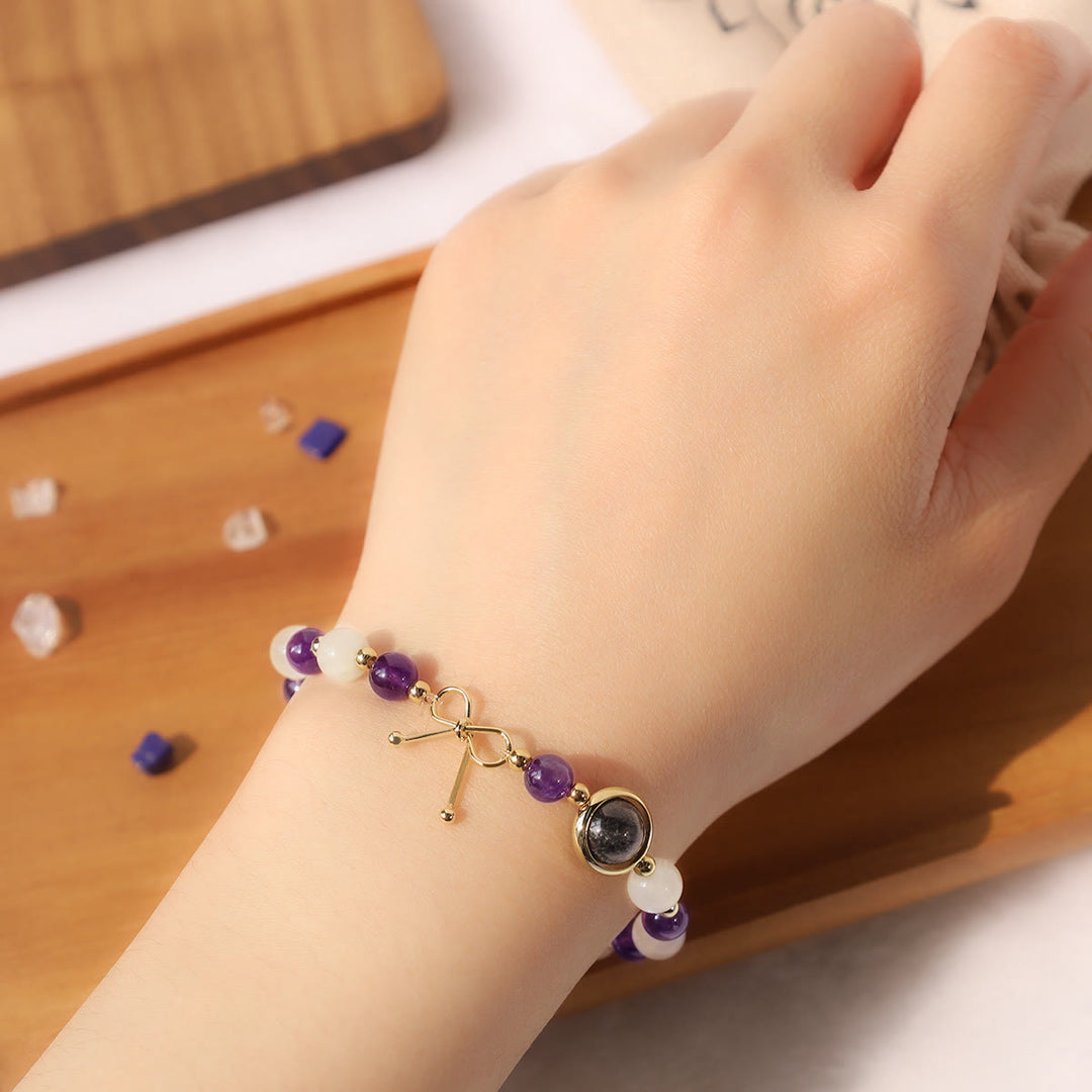 Bracelet de perles spirituelles en quartz rutile noir et améthyste œil de chat - image 4