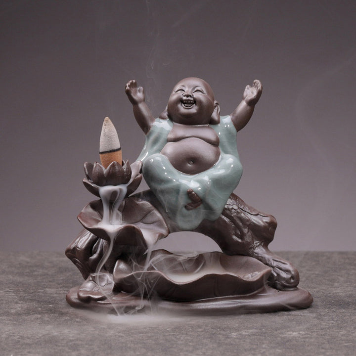 Brûleur d'encens en céramique avec bénédiction de lotus et petit moine en Buddha Stones