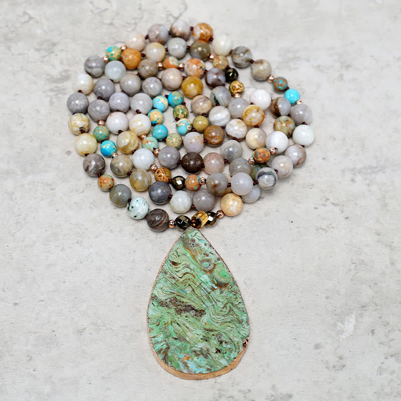 Collier de guérison en perles de jaspe Picasso naturel de l'océan Buddha Stones