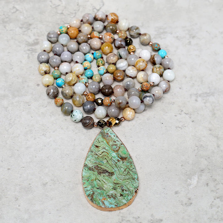 Collier de guérison en perles de jaspe Picasso naturel de l'océan Buddha Stones