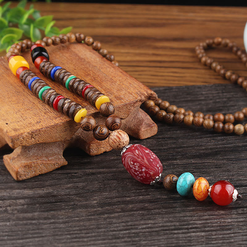 Collier pendentif en Buddha Stones tibétain en bois de wengé Bodhi Seed Agate Balance Peace