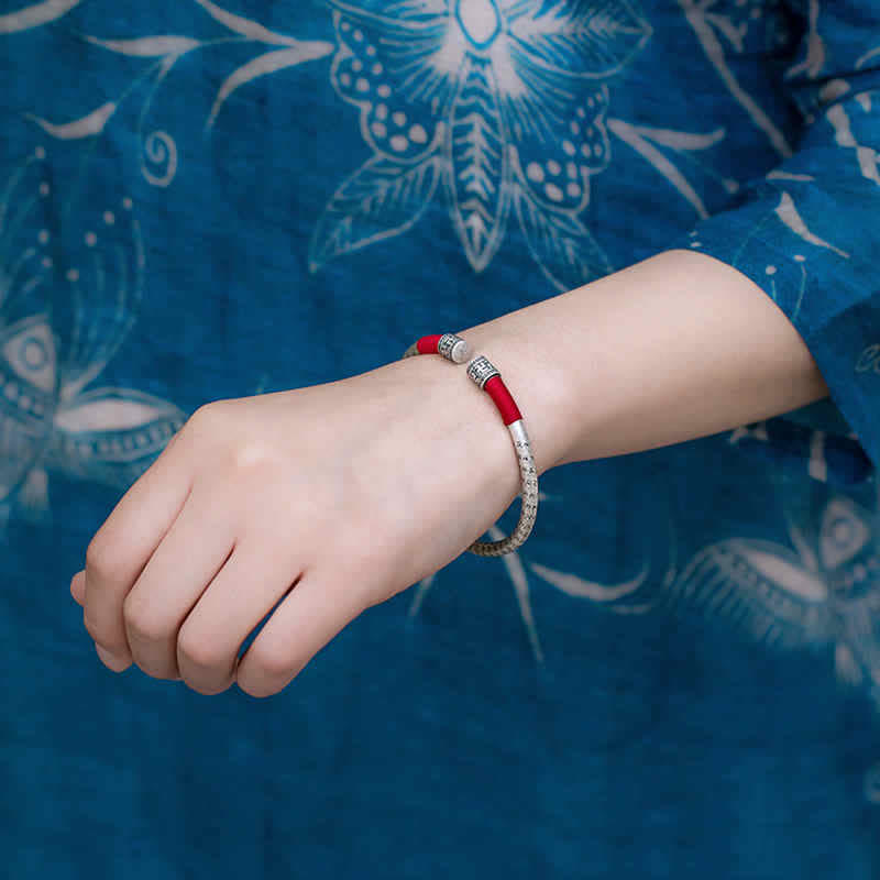 Bracelet en corde rouge porte-bonheur Buddha Stones tibétaines Om Mani Padme Hum