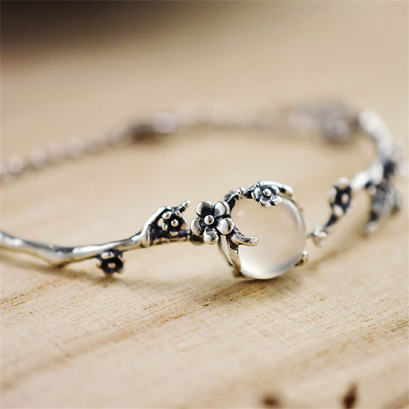 Bracelet positif en calcédoine et fleur de prunier avec Buddha Stones