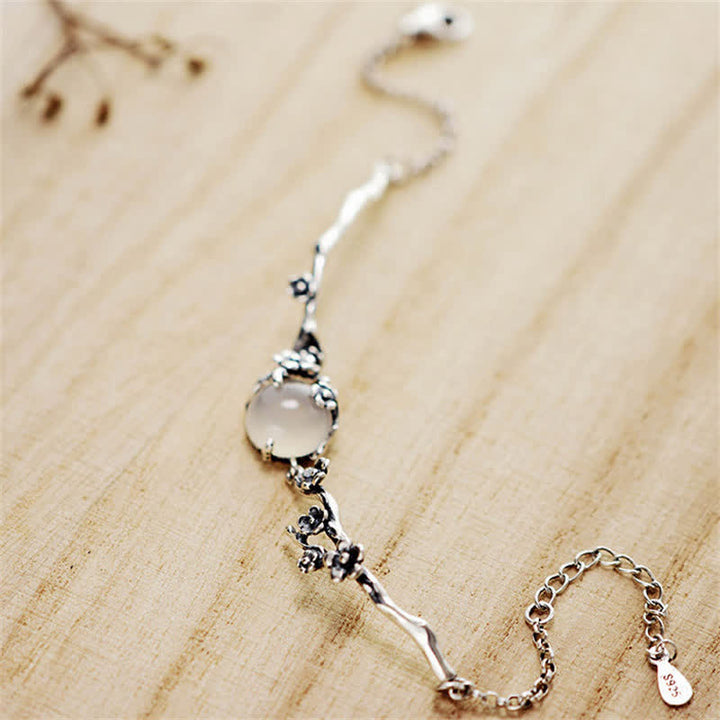 Bracelet positif en calcédoine et fleur de prunier avec Buddha Stones