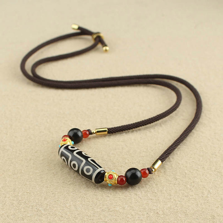 Collier pendentif en corde avec Buddha Stones