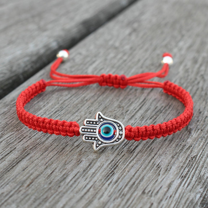 Bracelet en corde fait main avec symbole Hamsa et Buddha Stones