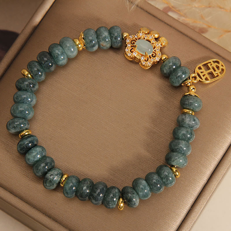 Bracelet en Buddha Stones en jade naturel avec breloque en forme de cadenas chinois, paix, chance et abondance