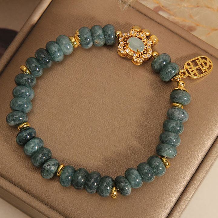 Bracelet en Buddha Stones en jade naturel avec breloque en forme de cadenas chinois, paix, chance et abondance