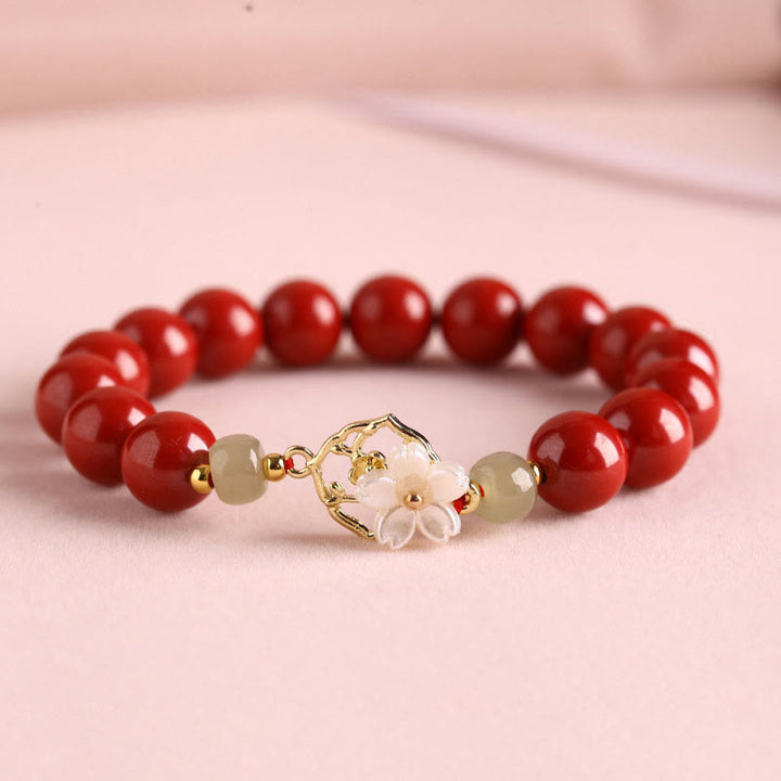 Bracelet de bénédiction en pierre de cinabre naturelle et jade Tridacna avec Buddha Stones