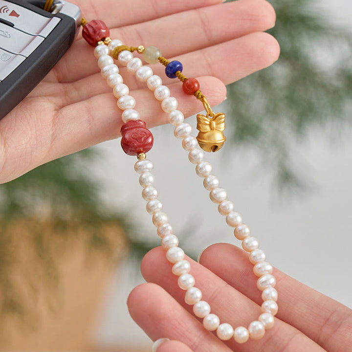 Buddha Stones Perle Naturelle Cinabre Sac d'argent Cloche Or Bête Avalante Lion Dansant Guérison Téléphone Décoration Suspendue