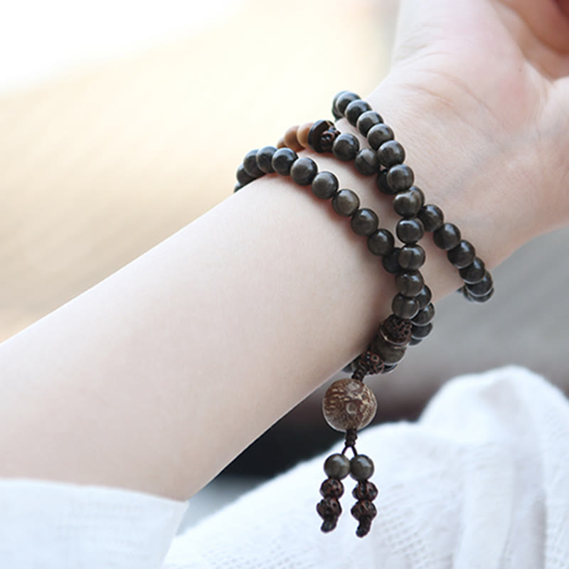 Bracelet Mala avec breloque de protection en bois de santal tibétain et Buddha Stones