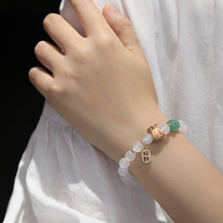 Buddha Stones Agate blanche naturelle Agate rouge Sac d'argent Caractère Fu Trèfle à quatre feuilles Bracelet de protection