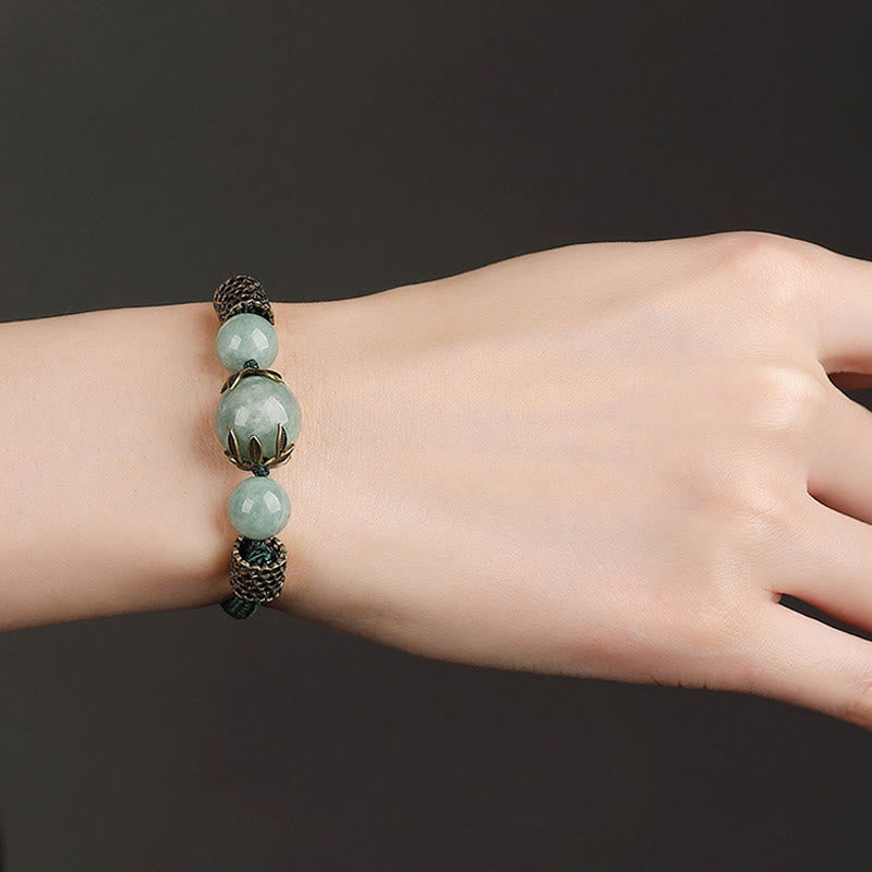 Bracelet de prospérité en perles de jade et corde verte fait main avec Buddha Stones