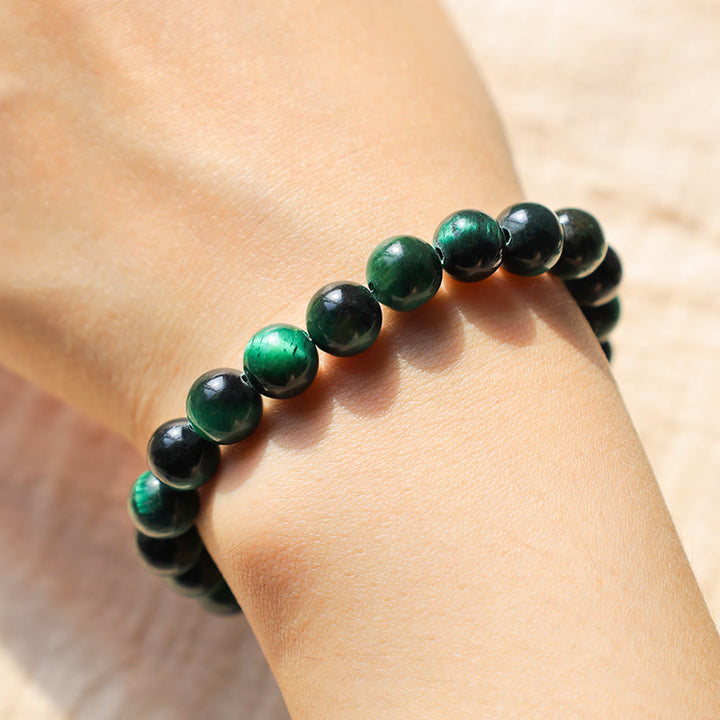 Bracelet énergétique de guérison et de croissance en œil de tigre Buddha Stones