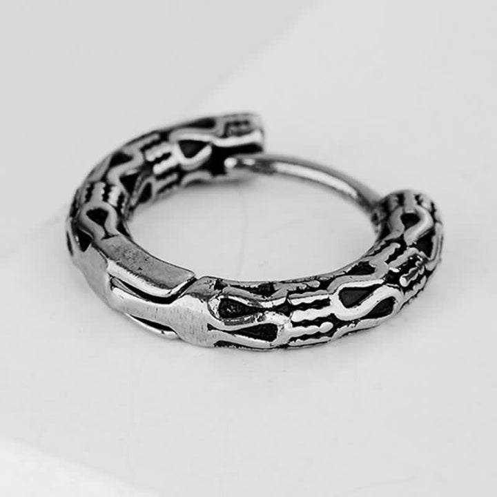 Boucles d'oreilles d'équilibre en acier titane à motif rétro
