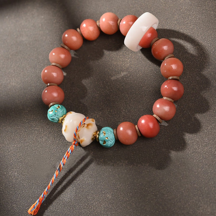 Bracelet porte-bonheur tibétain en perles dzi en Buddha Stones