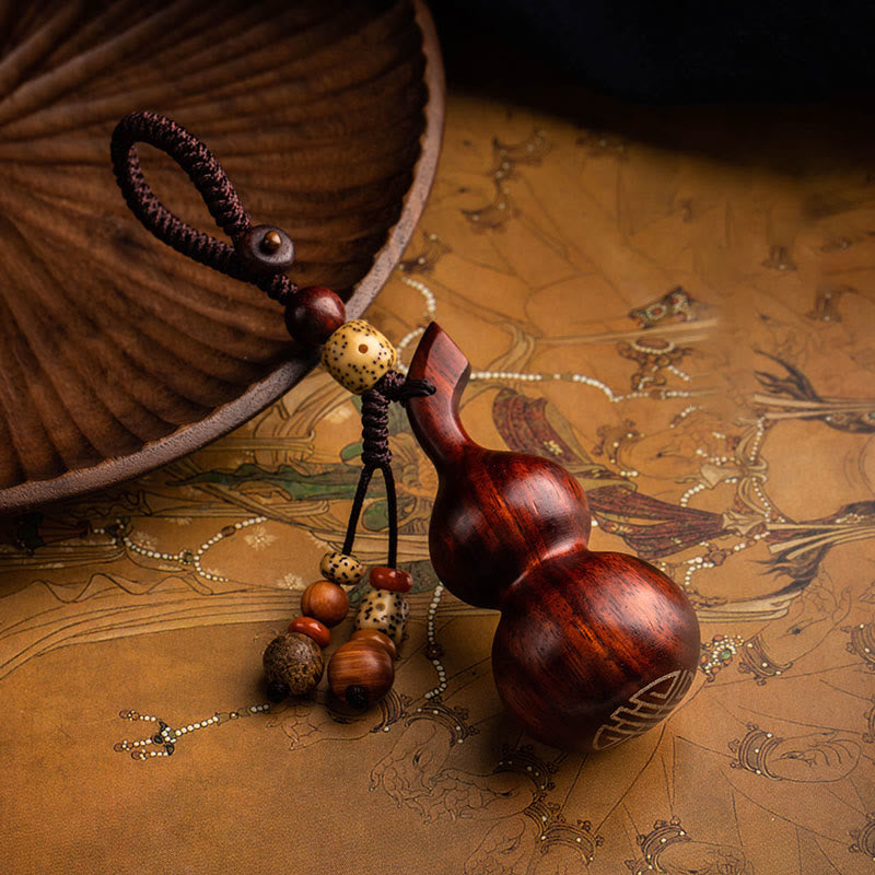 Porte-clés porte-bonheur en ébène tibétain à petites feuilles de gourde en bois de santal rouge