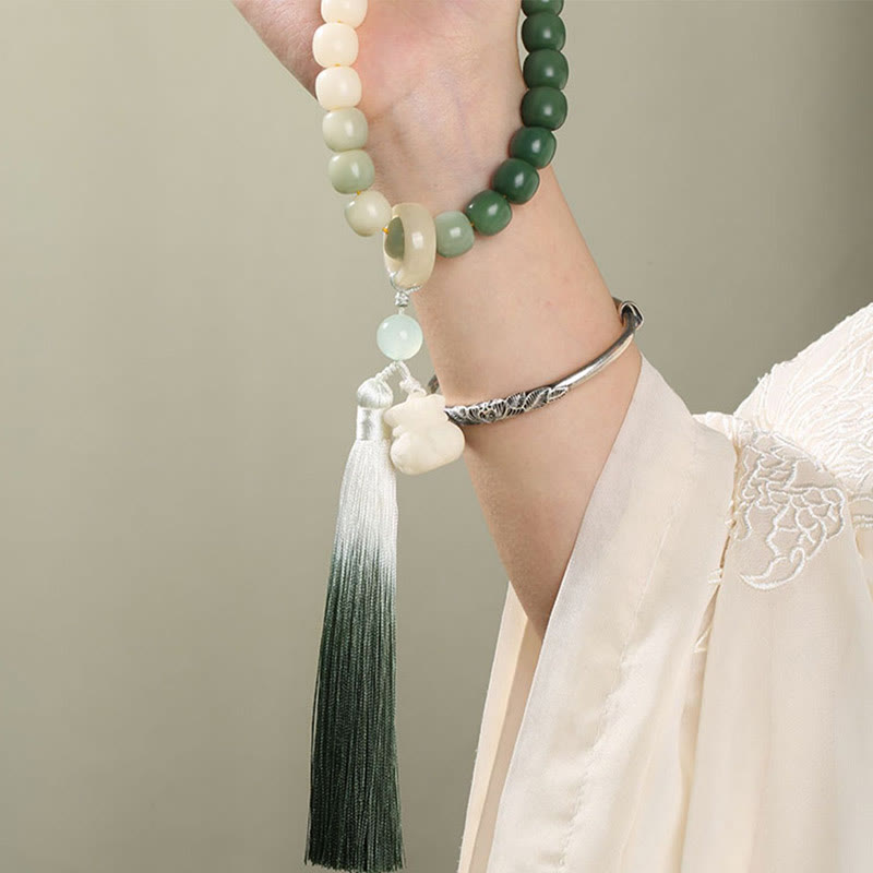 Buddha Stones Dégradé Naturel Graine de Bodhi Fortune Sac d'Argent Sagesse de Lotus Gland Poignet Mala