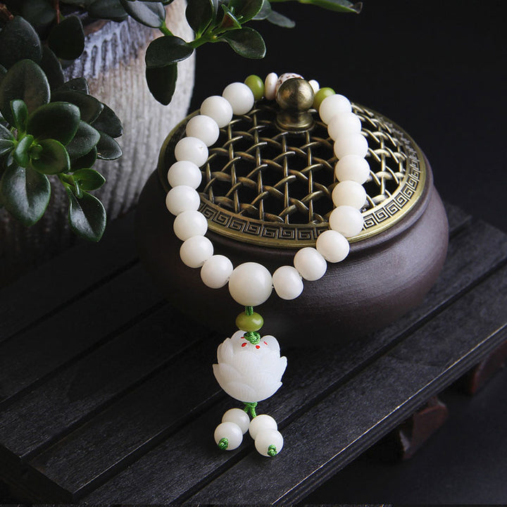 Bracelet porte-bonheur en Buddha Stones et lotus blanc naturel