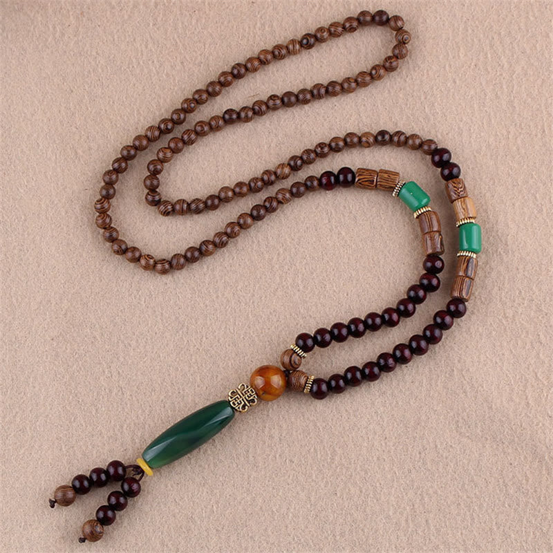 Collier pendentif protection éléphant en Buddha Stones tibétain en bois de wengé Bodhi Seed Agate