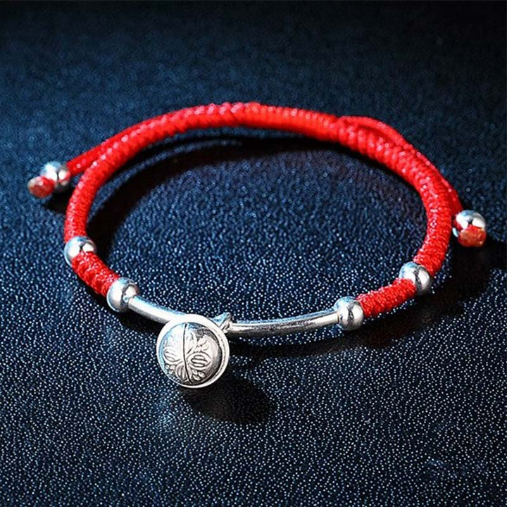 Bracelet Feng Shui porte-bonheur avec clochette rouge et Buddha Stones