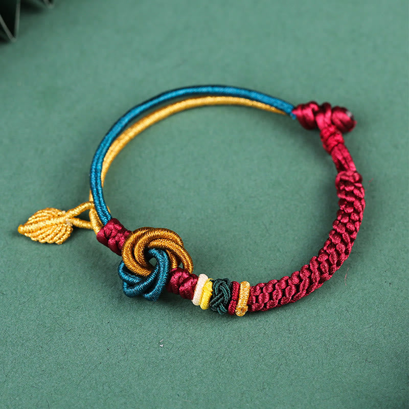 Bracelet tibétain en corde porte-bonheur fait main avec nœud mandala et Buddha Stones