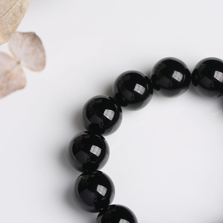Bracelet porte-bonheur en onyx noir naturel Buddha Stones
