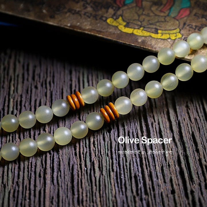 Bracelet porte-bonheur en ambre avec 108 Buddha Stones de Mala en corne de mouton du Tibet