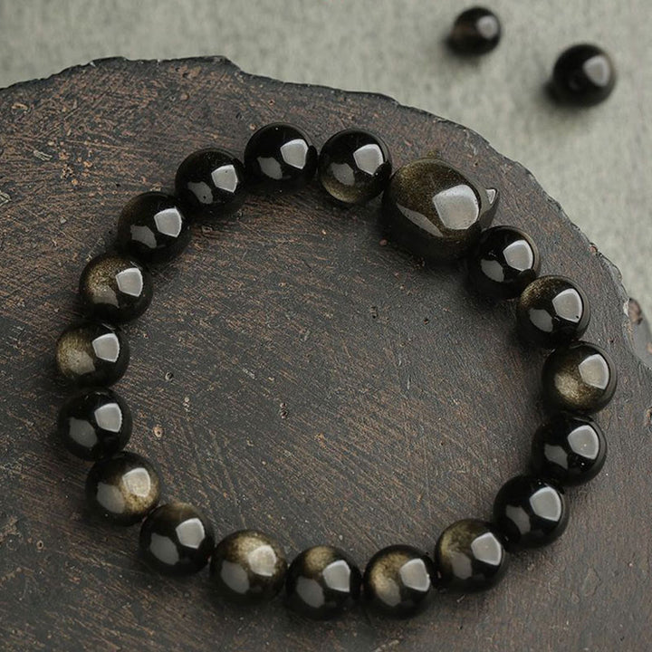 Bracelet de protection porte-bonheur en obsidienne dorée et argentée avec Buddha Stones et jolie patte de chat porte-bonheur - image 10