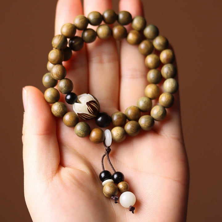 Bracelet double tour apaisant en bois de santal vert et graines de lotus Buddha Stones