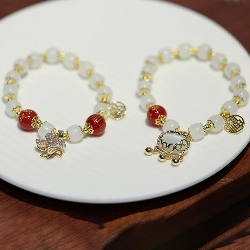 Bracelet de bénédiction avec breloque en forme de moulin à vent en Buddha Stones et caractère Fu