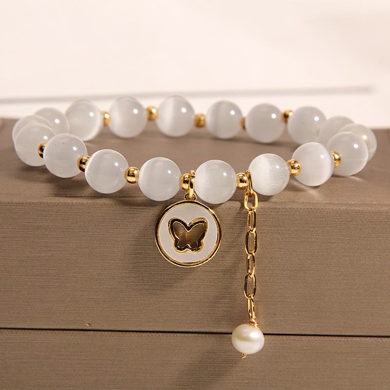 Bracelet d'amour avec breloque papillon œil de chat et Buddha Stones