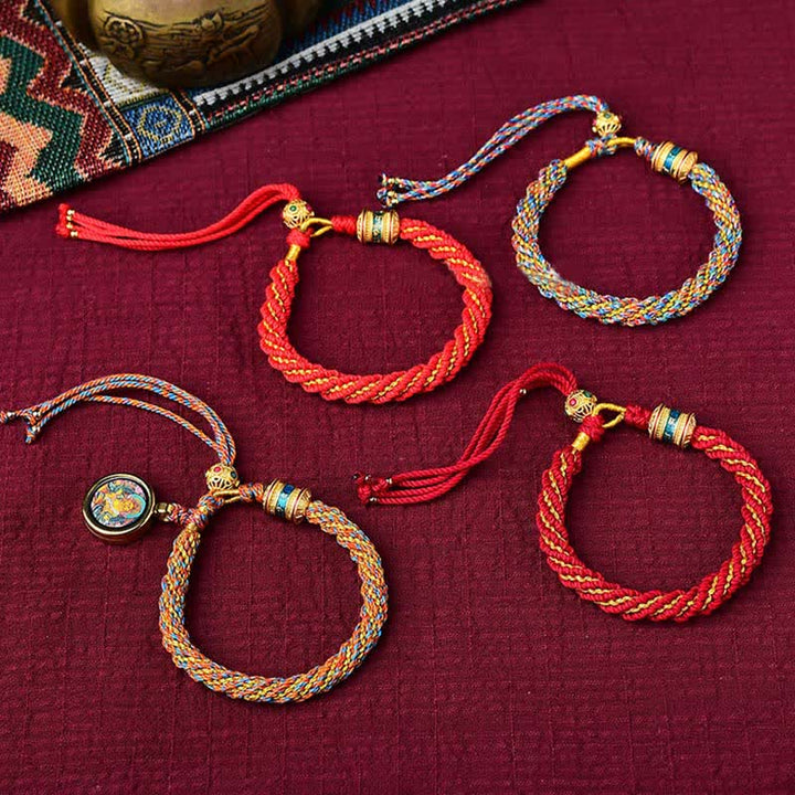 Bracelet tibétain en corde tressée avec breloque porte-bonheur Thangka en Buddha Stones