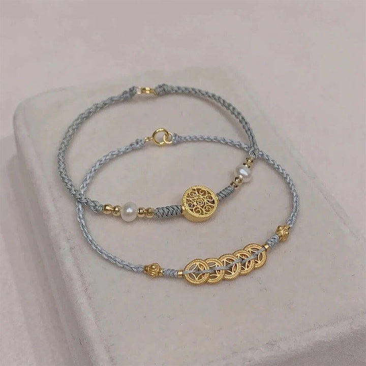 Bracelet tressé en corde bleue avec perles et arbre de fortune en cuivre et Buddha Stones