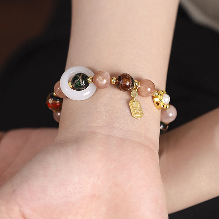 Buddha Stones Encens tibétain Cendres Verre Liuli Pierre Tridacna Pierre de Soleil Om Mani Padme Hum Bracelet à breloques pour roue de prière