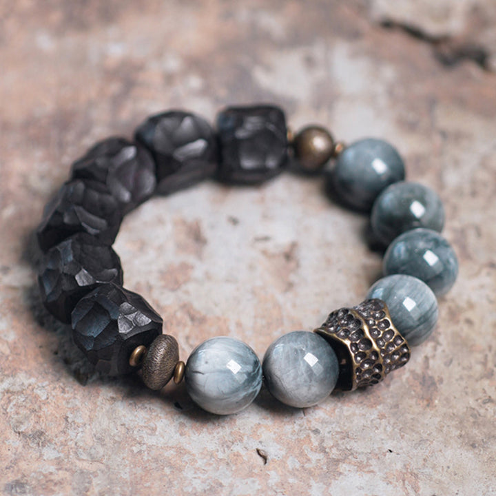 Bracelet de couple en cuivre et bois d'ébène avec pierre œil d'aigle et Buddha Stones