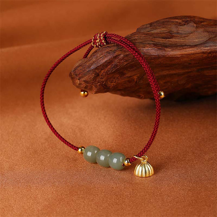 Bracelet tressé fait main en Buddha Stones de jade Hetian et gousse de lotus pour la prospérité et la chance