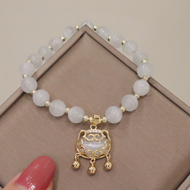Bracelet à breloques en perles avec motif de chat et œil de chat en Buddha Stones - image 10