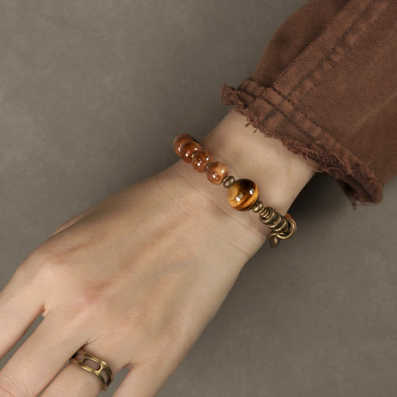 Bracelet porte-bonheur en cuivre et obsidienne dorée avec Buddha Stones de Kuka et œil de tigre