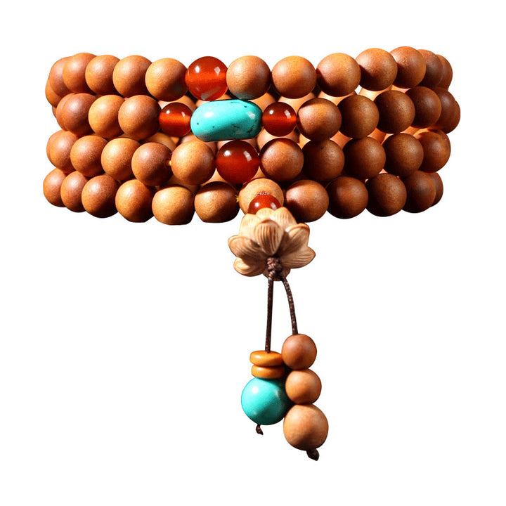 Bracelet Mala à breloques tibétaines en bois de santal et lotus avec Buddha Stones
