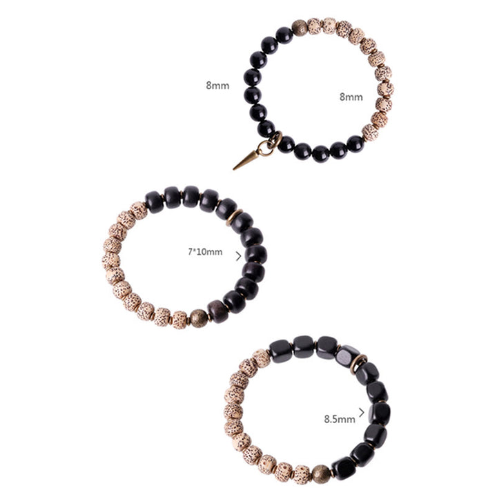 Bracelet de paix en cuivre et bois d'ébène avec Buddha Stones et graines de Bodhi tibétaines