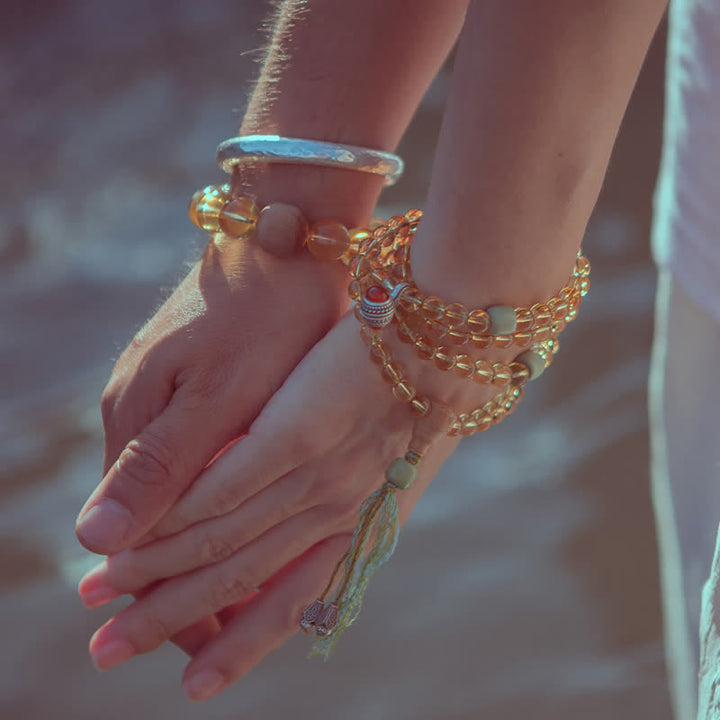 Bracelet Mala 108 Buddha Stones, citrine, bois de santal, turquoise, protection et prospérité - image 1