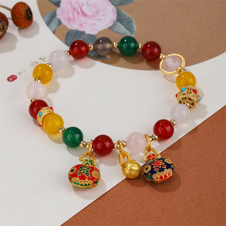 Bracelet de réussite en cristal d'agate Buddha Stones et famille de bêtes avaleuses d'or