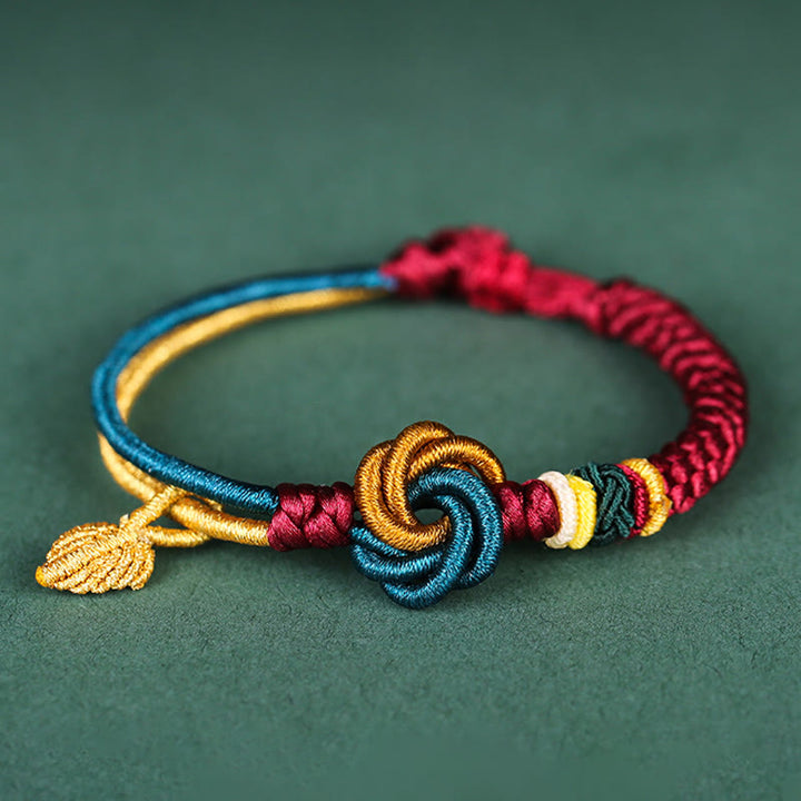 Bracelet tibétain en corde porte-bonheur fait main avec nœud mandala et Buddha Stones