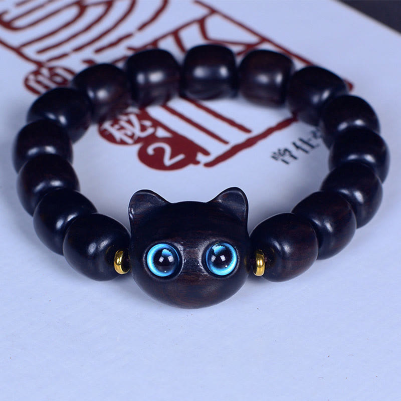 Bracelet Buddha Stones Bois d'ébène Verre Liuli Joli Chat Paix Équilibre - Perles en ébène 12 x 11 mm x 15 (tour de poignet 14-16 cm) - image 16