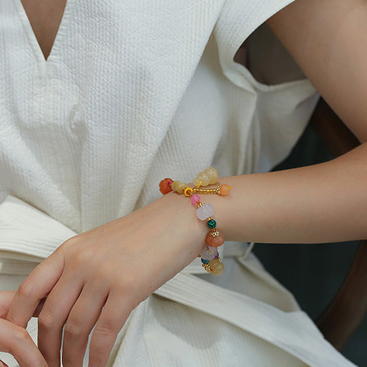 Bracelet à breloques en perles de citrouille Pixiu en soie dorée naturelle et cristaux de jade