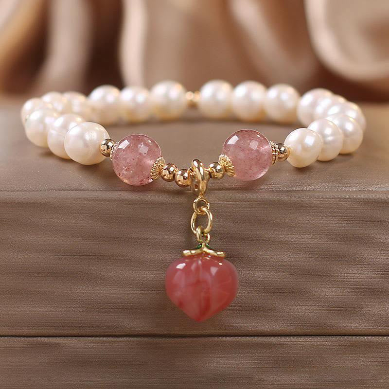 Bracelet à Buddha Stones en perles naturelles et quartz fraise, pêche, amour, cœur, sagesse