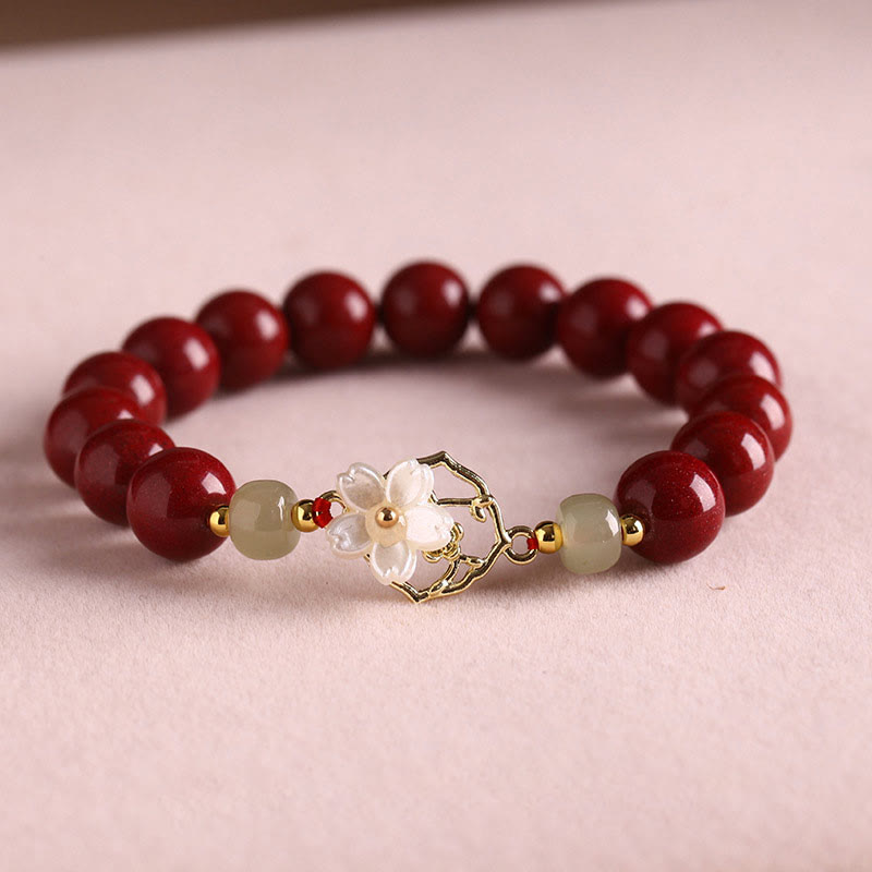 Bracelet de bénédiction en pierre de cinabre naturelle et jade Tridacna avec Buddha Stones