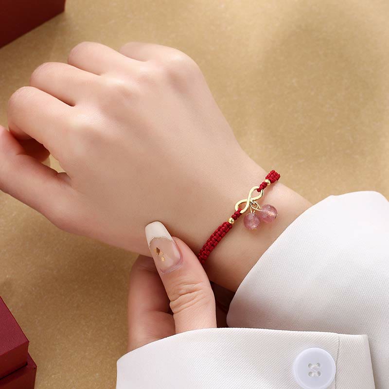 Bracelet tissé en fil rouge avec nœud sans fin en cristal de quartz fraise et Buddha Stones