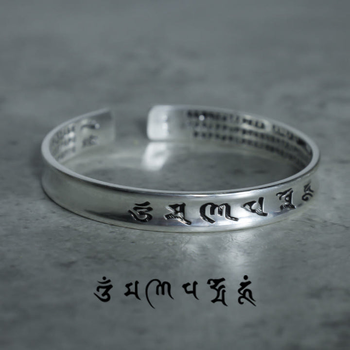 Bracelet en cuivre blanc avec mantra tibétain et Buddha Stones